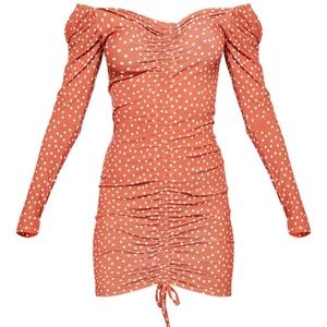 Polka dot ruched front long sleeve body con dress